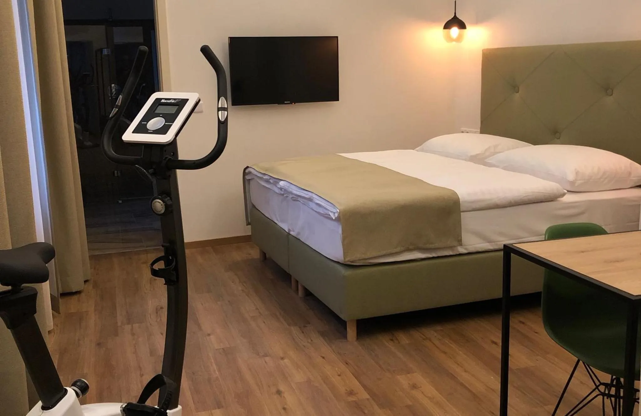 Deluxe double room with lounge chair